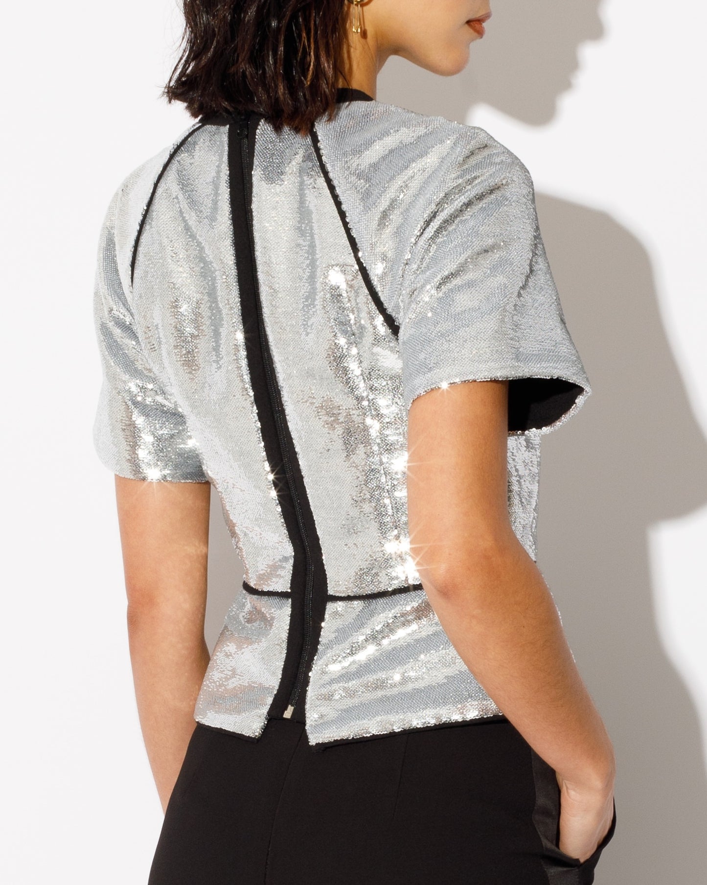 silver and black sequin top with peplum